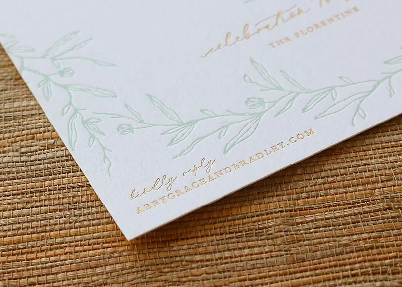 Detail of gold foil stamping showing the sharp, dimensional finish on a floral pattern
