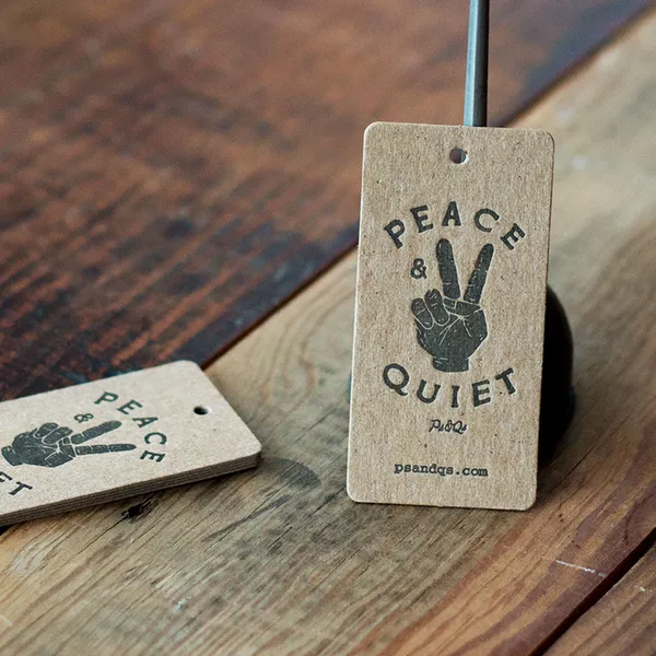 Chipboard letterpress hang tags in black ink