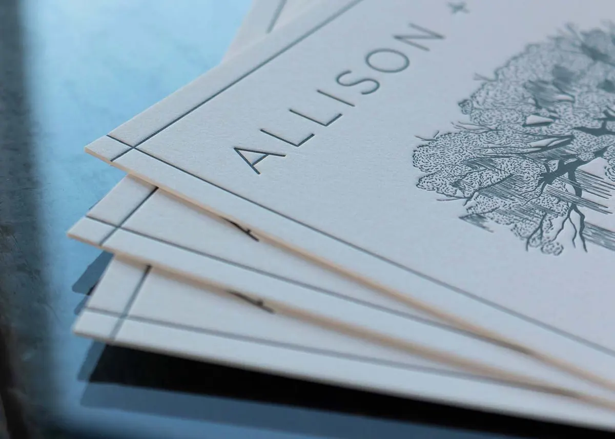 Detail of letterpress live oak tree and Spanish moss illustration with deep impression