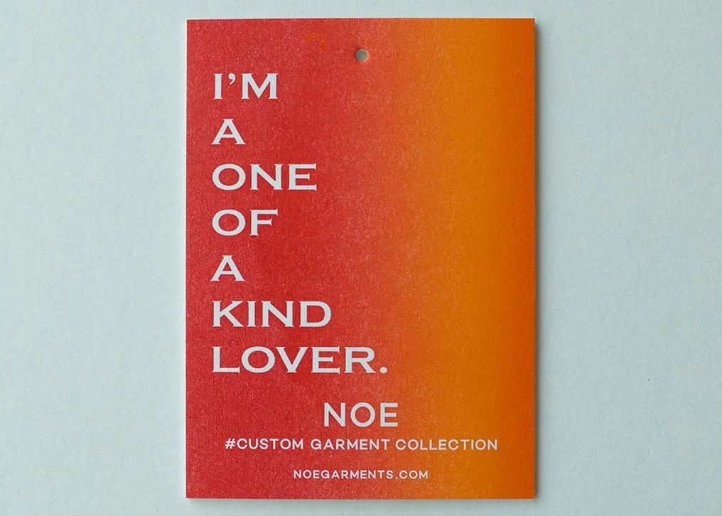 Close-up of split fountain ink gradient showing colors blending across the hang tag surface