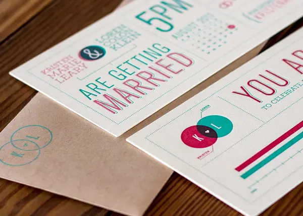 Three-color letterpress wedding invitation with overlapping ink colors on thick cotton paper